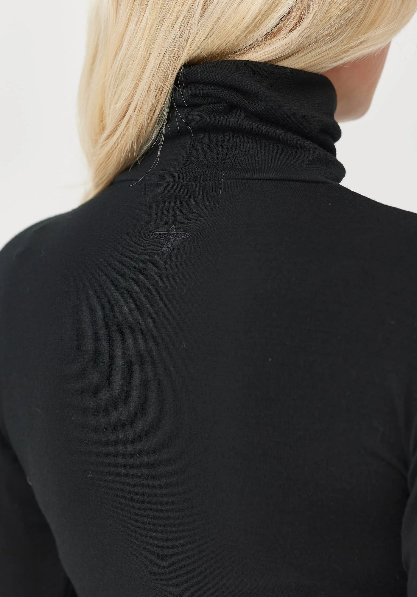 Untouched World Roll Neck