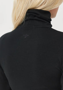 Untouched World Roll Neck